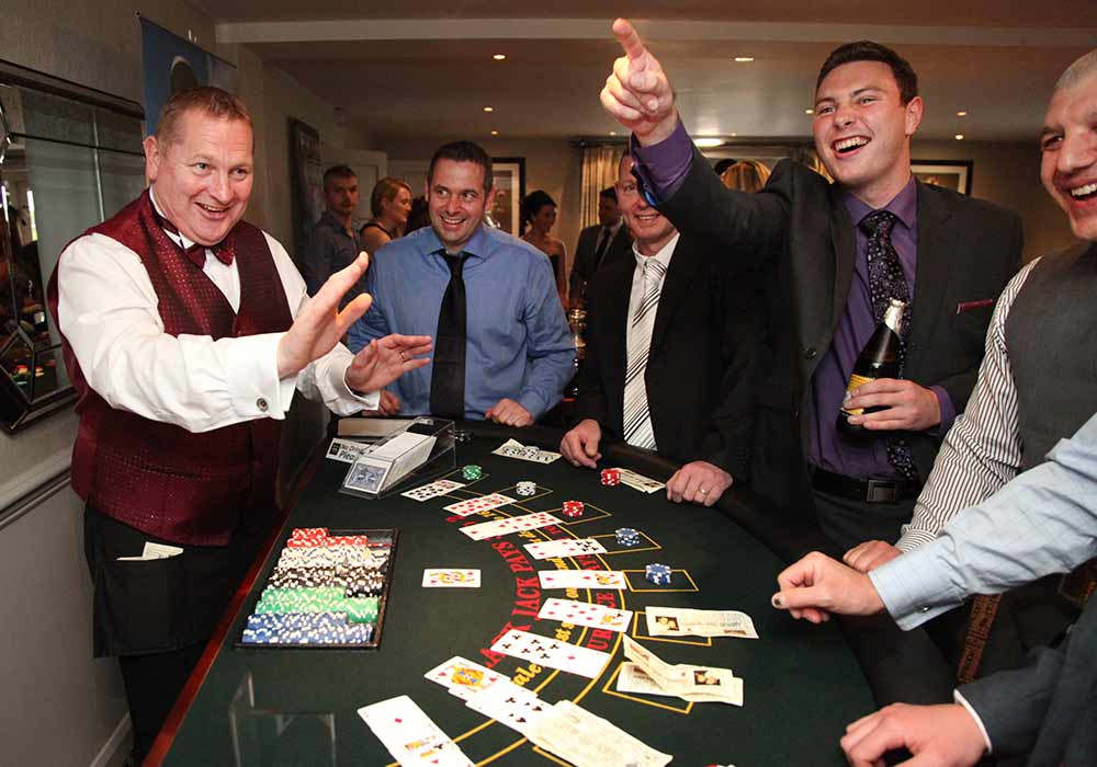 Croupier dealing cards at a corporate event